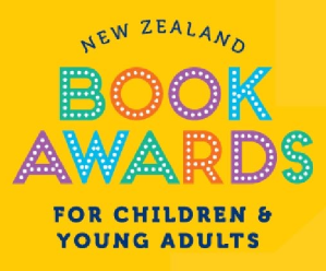 Hero image for the New Zealand Book Award Trust's Book Award for Children and Young Adults featuring a bright dark yellow background with the name of the award overtop with the words "Book Awards" in bright green, orange, red, and blue colors with white dots imitating the lights of signage within the lettering.