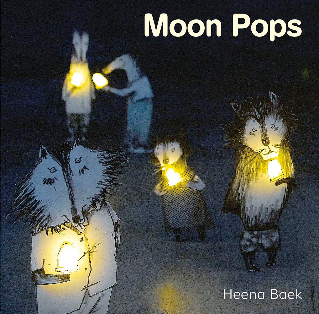 Cover for Moon Pops featuring a photograph of an illustration of pencil drawn animals holding yellow lamps that are physically lit up. The background is a dark grey blue.