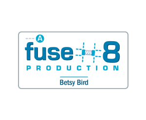 Hero image for the "A Fuse 8 Production" blog featuring their logo which is the text "A Fuse 8 Production" in varying blue styles and colors with Betsy Bird's name below it on a white background and surrounded by a grey rectangular outline with rounded corners. There are some illustrated flourishes in the logo that are zipper-like.