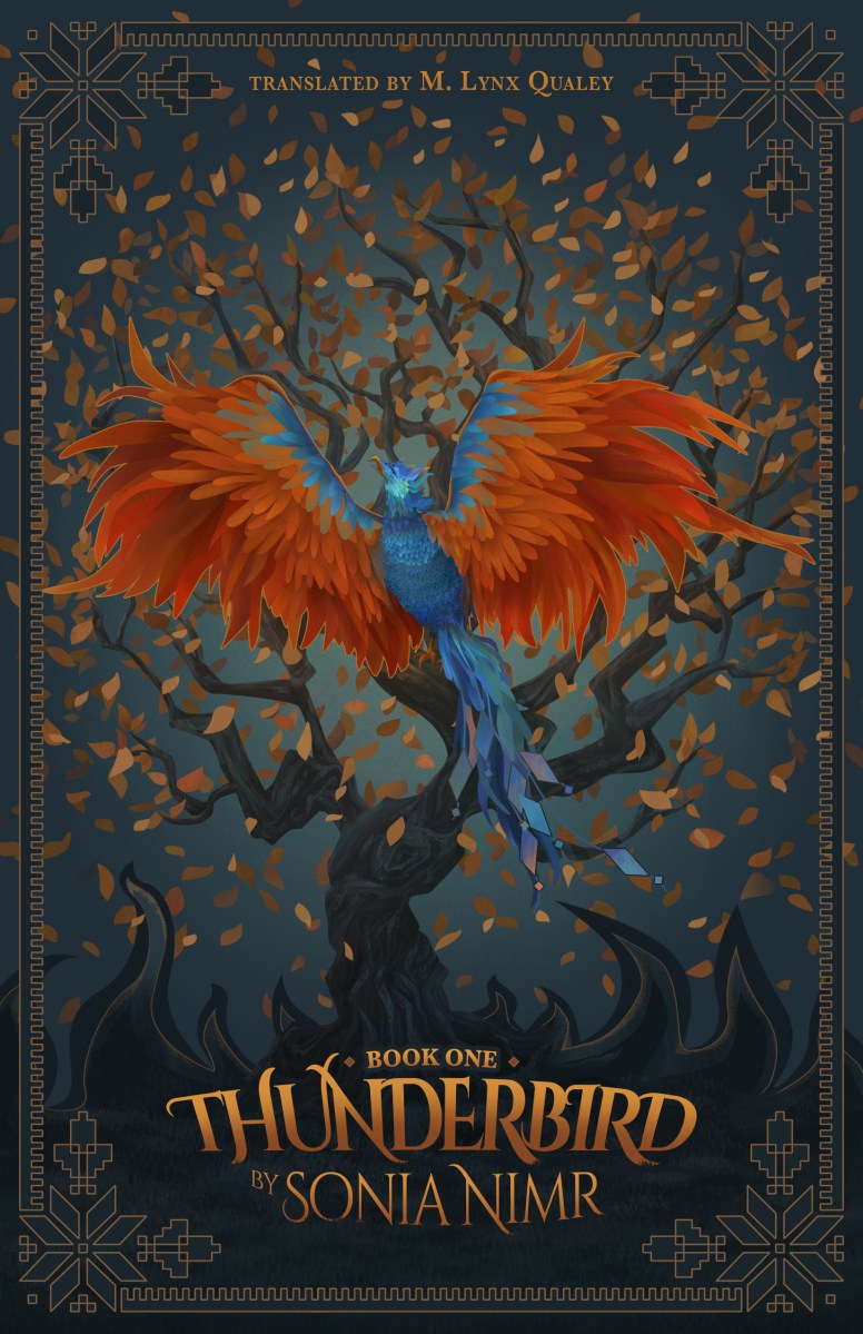 Cover of Thunderbird: Book One featuring an illustration of an orange and blue phoenix-like bird in front of a tree with brown leaves and stylized flames at the base. The cover has a stylized border made of snowflake-like shapes at the corners and comb-like shapes at the borders.