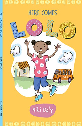 Cover for Here Comes Lolo featuring an illustration of a young girl in jeans, blue sneakers, and a pink floral t-shirt with white flowers on it with a car, house and clouds in the background. The cover's background is orange and the word "Lolo" in the title is displayed in large letters with each letter featuring a different colorful pattern. There is a border of yellow graphic flourishes along the top and bottom of the cover.